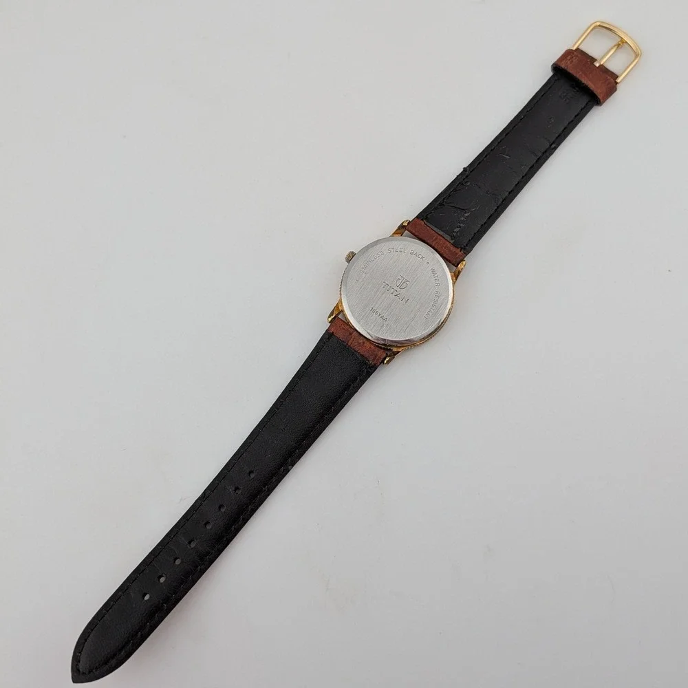 Titan 366YAA 4 Hand Pointer Date Gold Tone Quartz Watch Brown Leather 32mm